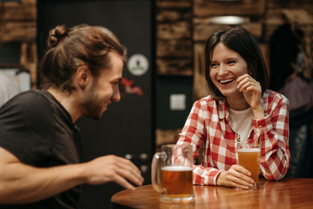 Couple discussing beer choices